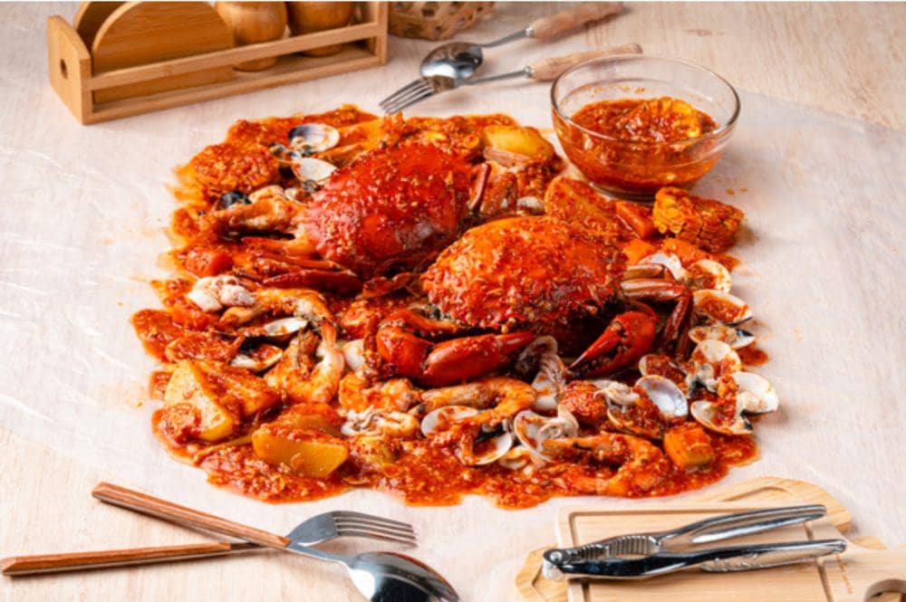 ilustrasi kepiting saus tiram (vecteezy.com/sensasilapar9697)