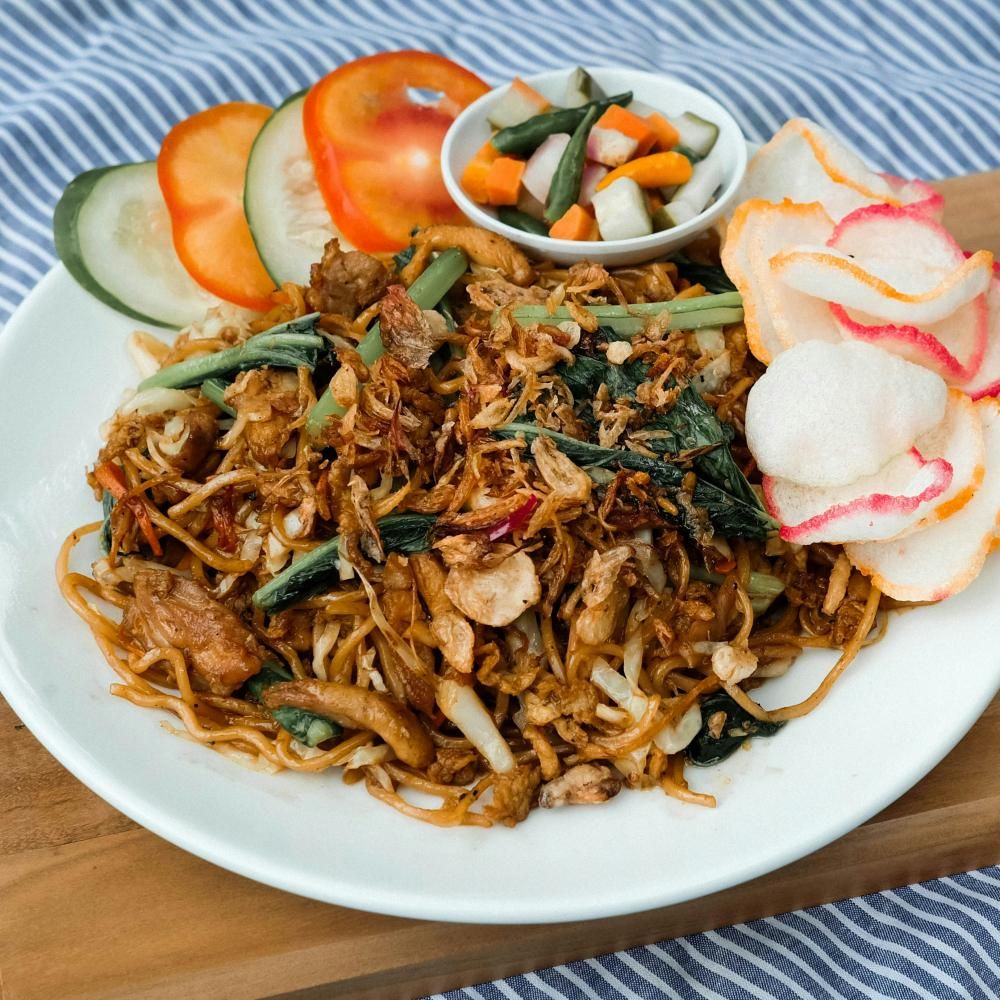 https://unsplash.com/photos/a-plate-of-food-on-a-table-with-utensils-i5XurHSjE1M