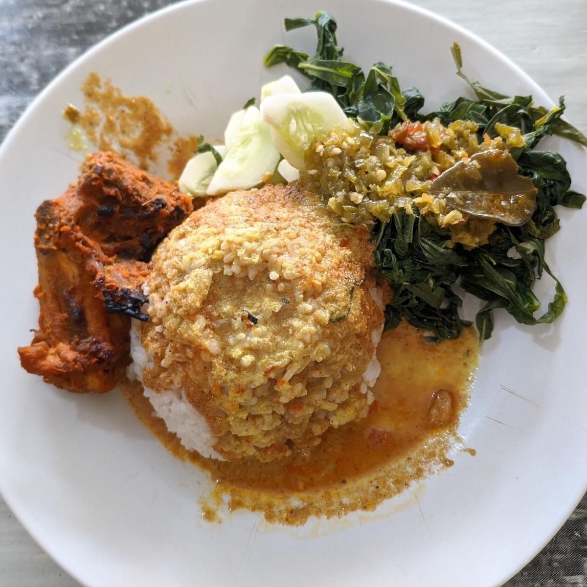 medium-vecteezy_a-portion-of-nasi-padang-served-on-a-table-which-consists_47071313_medium.jpg