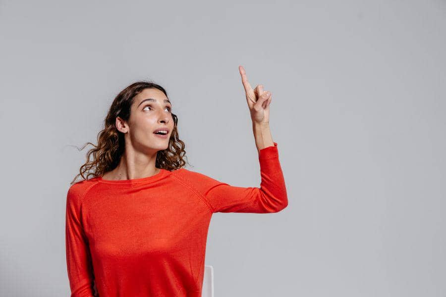 https://www.pexels.com/photo/a-woman-in-red-long-sleeve-shirt-8638227/