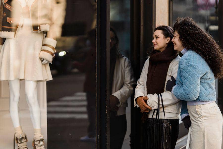https://www.pexels.com/photo/positive-young-female-friends-looking-through-showcase-of-boutique-6567619/